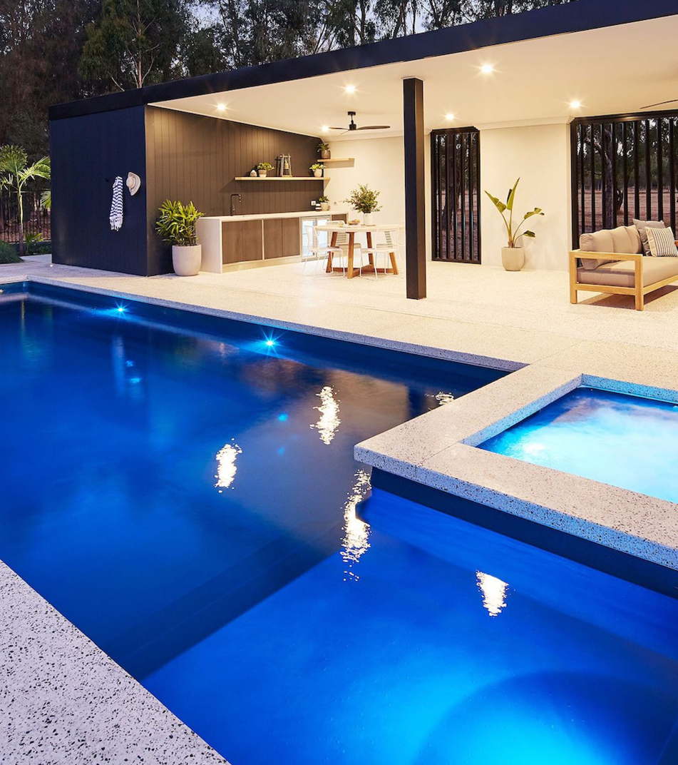 Fibreglass pool and spa installed beside an outdoor entertaining area